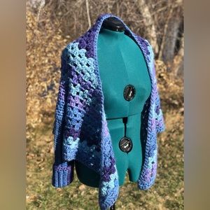 Handmade statement sweater with sleeves